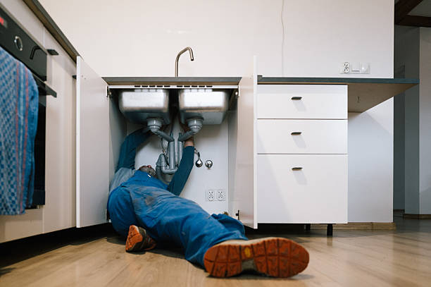 Professional Drain Cleaning technician working in Elk Grove Village, IL